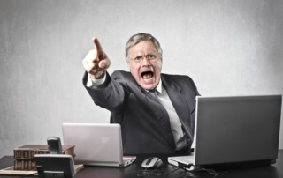 toxic workplace: boss yelling from his desk