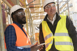 General Foreman and Assistant Superintendent working on a construction site; salary ranges for general foremen and assistant superintendents